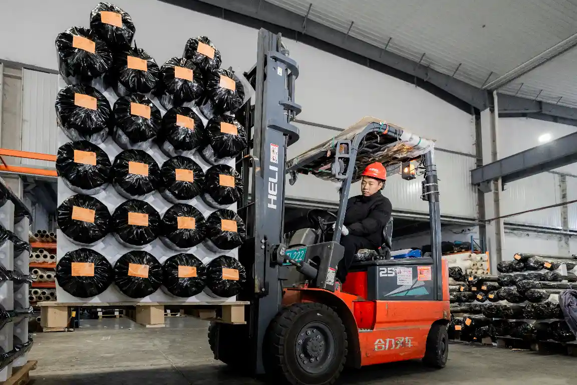 Forklifts are used to transport packaged TPU films to destinations worldwide.