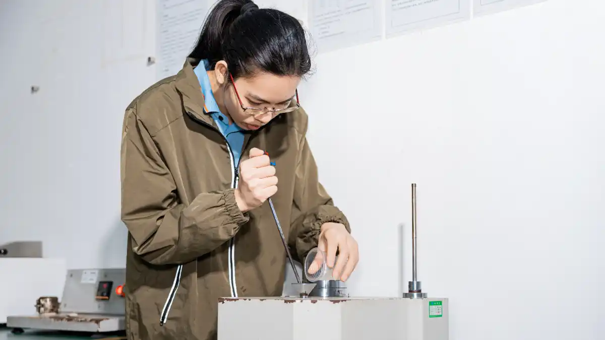 Employees conducting raw material testing